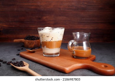 Coffee Drink And Vanilla Ice Cream In A Mug, Coffee Beans, On A Rustic Wooden Table. 'Affogato' Italian-style Dessert (spot Focus)