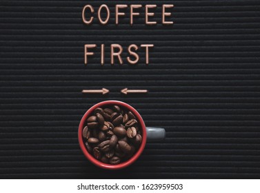 Coffee First Words On Modern Letter Board At White Background, Top View. Overhead, Flat Lay, From Above. Red Coffee Mug With Fresh Coffee Beans