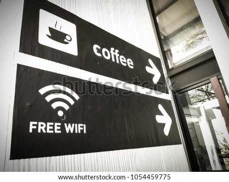coffee and free wifi sign in coffee shop.vintage color tone background 