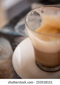 Coffee Glass Close Up On The Table Half Full