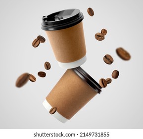 Coffee to go. Paper cups and roasted beans flying on light background - Powered by Shutterstock