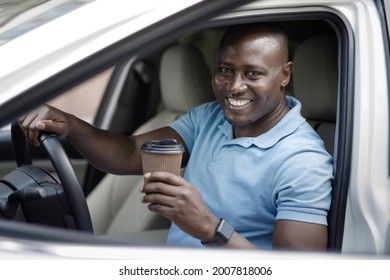 Coffee To Go, Take Away, Drive In Service Concept. Cheerful African American Man Driver In Casual Outfit Drinking Coffee In Paper Cup While Driving Nice White Automobile, Going To Office