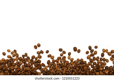 Coffee grains in the bottom of the image on a isolated white bacKGROUND