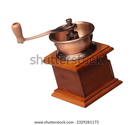 Coffee Grinder fly float in air, vintage Coffee mill for coffee bean to crush into ground powder over White background Isolated high speed shutter, freeze motion