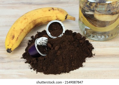 Coffee grounds from espresso coffee capsules and banana peels for plants better growing.  Eco friendly and cheap way how to manure plants and flowers. 