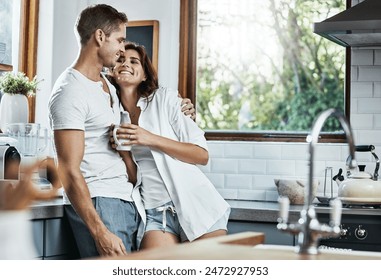 Coffee, hug and happy couple in home kitchen for romance, care or bonding together with love connection. Man, woman and people embrace in smile celebration of marriage anniversary in the morning - Powered by Shutterstock