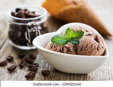 Coffee Ice Cream And Coffee Beans On A Old Wooden Table