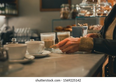 Coffee In An Italian Bar. Woman Take A Cup. Tradition Drink Coffee In Italy.