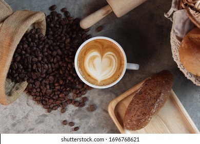 Coffee Latte Art In Cafe And Bread