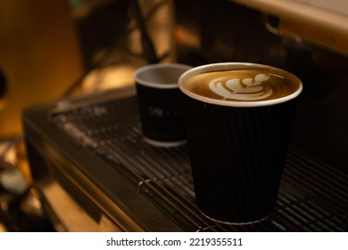 Coffee latte art on coffee machine.