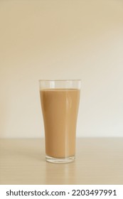 Coffee Latte Glass With Ready To Drink Coffee Bottles On The Table