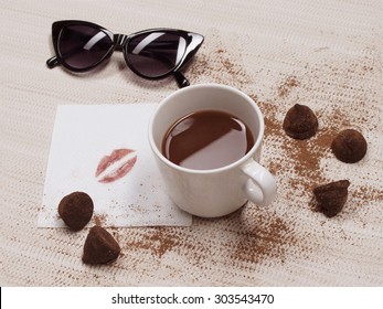 coffee with love. hot chocolate, kiss and sunglasses.coffee shop still life