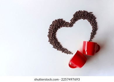 Coffee lover. Top view of red  cup and Coffee beans arranged in a beautiful heart shape on white background.  Festive card for Valentines Day. top view. flat lay. 3D illustration - Powered by Shutterstock