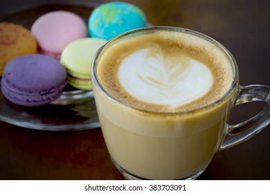 Coffee and macaroons on table 