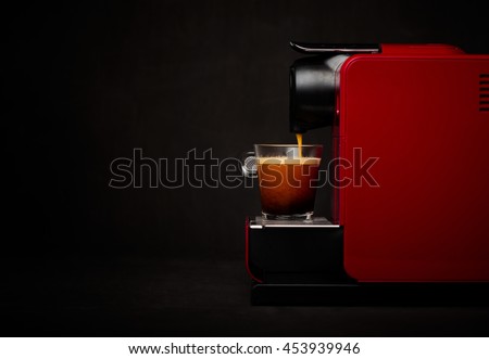 Coffee machine with cup of coffee