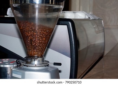 Coffee machine makes coffee with coffee beans.
