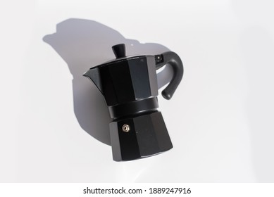 A coffee maker machine with white back ground