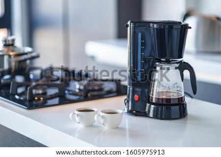 Coffee maker for making and brewing coffee at home. Coffee blender and household kitchen appliances for makes hot drinks