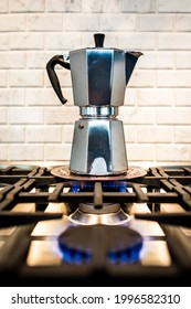 Coffee Maker On A Kitchen Gas Stove With Flames