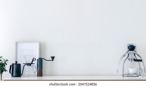 Coffee making equipment decorate on white table with copy space and panoremic view. Mockup coffee making epuipment on wooden table with copy space. - Powered by Shutterstock