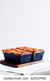 Coffee Mini Loaf Cake In The Baking Tins. Light Food Photography. Copysapce For Text. Food Blogging Concept