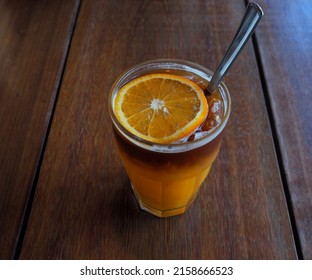 Coffee Mix With Orange Juice And Cold Brew Fusion Coffee On The Wooden Table In Cafe, Focus One Point