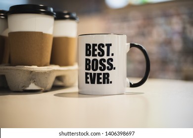 A Coffee Mug With Best Boss Ever Printed On It. 