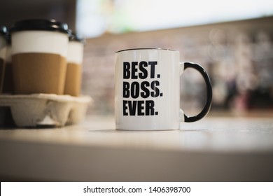 A Coffee Mug With Best Boss Ever Printed On It. 