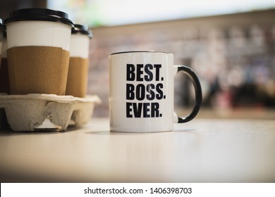 A Coffee Mug With Best Boss Ever Printed On It. 