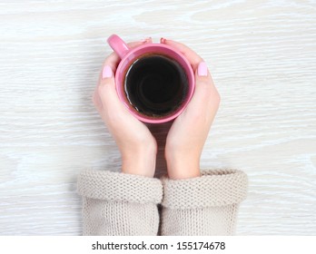 coffee mug in hand