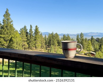 Coffee mug on a porch over looking Helena Montana - Powered by Shutterstock