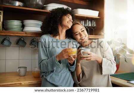 Coffee, orange juice and happy lesbian couple in home, bonding and communication. Drink tea, gay women and girls smile in the morning at breakfast together in interracial relationship, care and LGBT