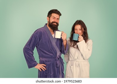 Coffee Is Our Tradition. Man And Woman Happy Together. Family Traditions. Daily Life And Routine. Couple In Cozy Bathrobes Enjoy Lazy Weekend. Drinking Coffee. Brewing Coffee At Home. Hot Drink