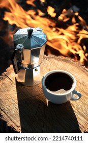 Coffee Outdoors. Cup Of Black Coffee And A Moka Pot On A Stump I