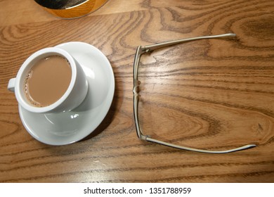 Coffee and a pair of spectacles 
