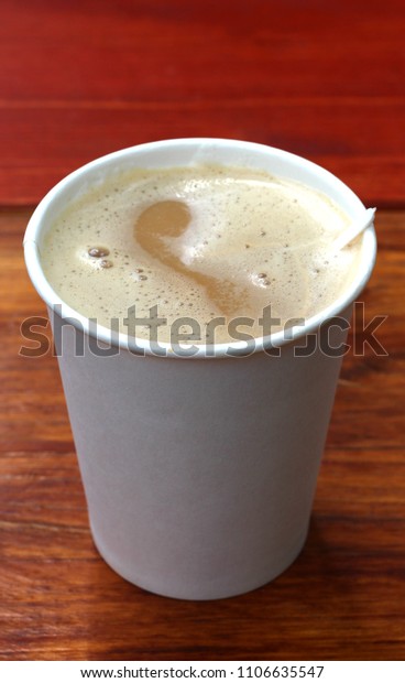 coffee in a paper cup