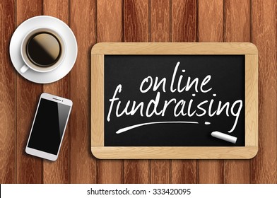 The Coffee, Phone  And Chalkboard With Word Online Fundraising