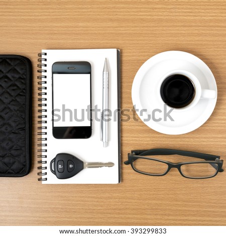 Similar – Business objects, cup of coffee, pen, phone and glasses.