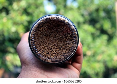 Coffee pot in the hand natural photo capture at Dhaka, Bangladesh. 2 December 2020