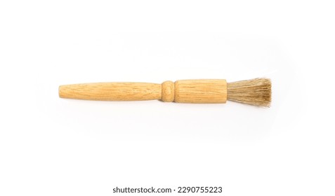 Coffee powder brush isolated on white. Wooden brush for cleaning coffee powder from coffee bean grinder. Close up image. - Powered by Shutterstock