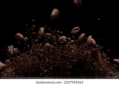 Coffee powder fly explosion, Coffee crushed ground float pouring, wave like smoke smell. Coffee ground powder splash throwing in mid Air. Black background Isolated selective focus blur - Powered by Shutterstock