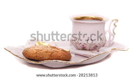 coffee in the procelain cup with spoon