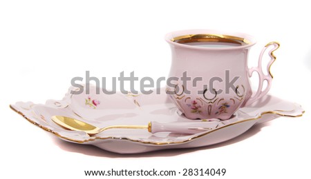 coffee in the procelain cup with spoon