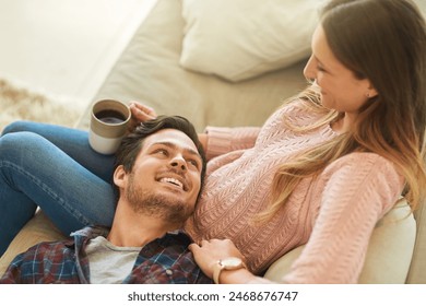 Coffee, relax or happy couple on sofa in home living room together with love, support or trust. Talk, above or romantic man bonding with woman with loyalty, wellness or smile in marriage commitment - Powered by Shutterstock