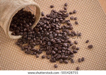 coffee sacks, bag of coffee beans on a Wood weave background