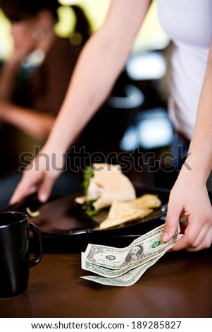 Coffee: Server Takes Tips From Table