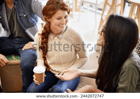 Coffee shop, discussion and women with drink in conversation, talking and chatting for social visit. Friends, happy and people with caffeine, cappuccino and beverage in restaurant, cafe and store