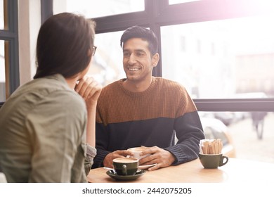 Coffee shop, happy and couple with drink on date in conversation, talking and chatting for bonding. Love, relax and man and woman with caffeine, cappuccino and beverage in restaurant, cafe and store - Powered by Shutterstock