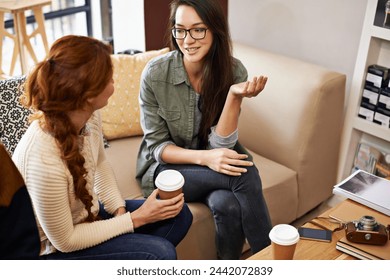 Coffee shop, happy and and women with drink in conversation, talking and chatting for social visit. Friends, discussion and people with caffeine, cappuccino and beverage in restaurant, cafe and store - Powered by Shutterstock