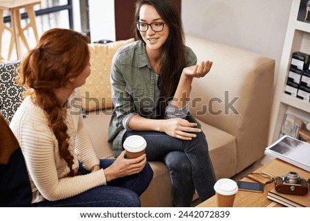 Coffee shop, happy and and women with drink in conversation, talking and chatting for social visit. Friends, discussion and people with caffeine, cappuccino and beverage in restaurant, cafe and store